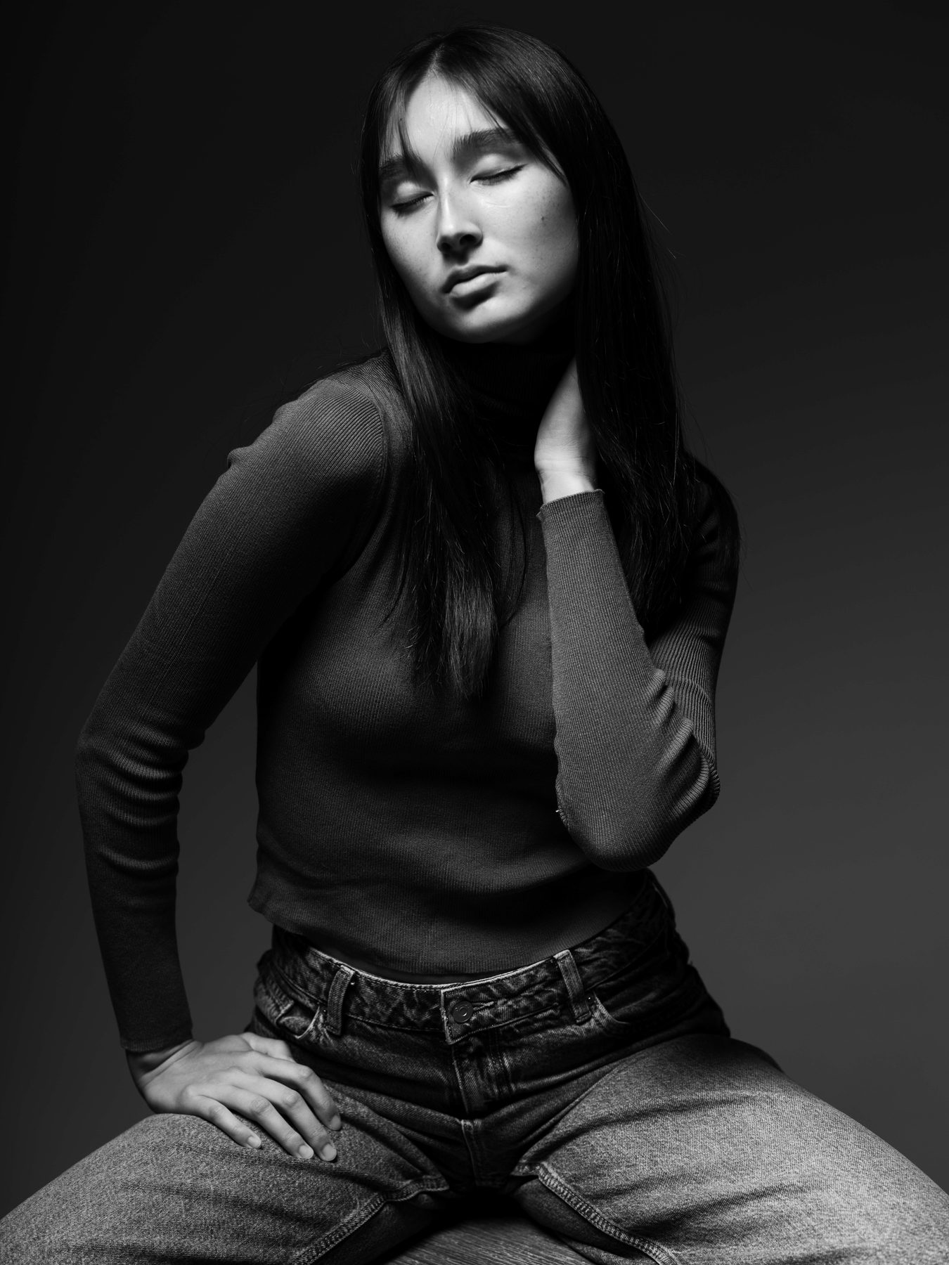 Maya Kilburn seated, black-and-white editorial portrait